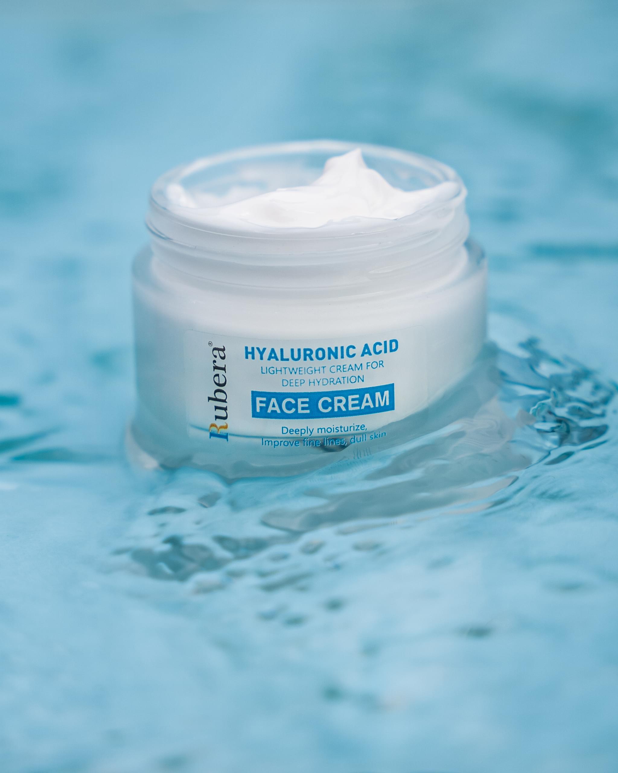 Hyaluronic Acid | Unique Beautiful Product| Face Cream (50g) 1 Rubera Hyaluronic Acid Face Cream – Lightweight cream for deep hydration, shown in a water-themed setting to represent moisture and skincare benefits.